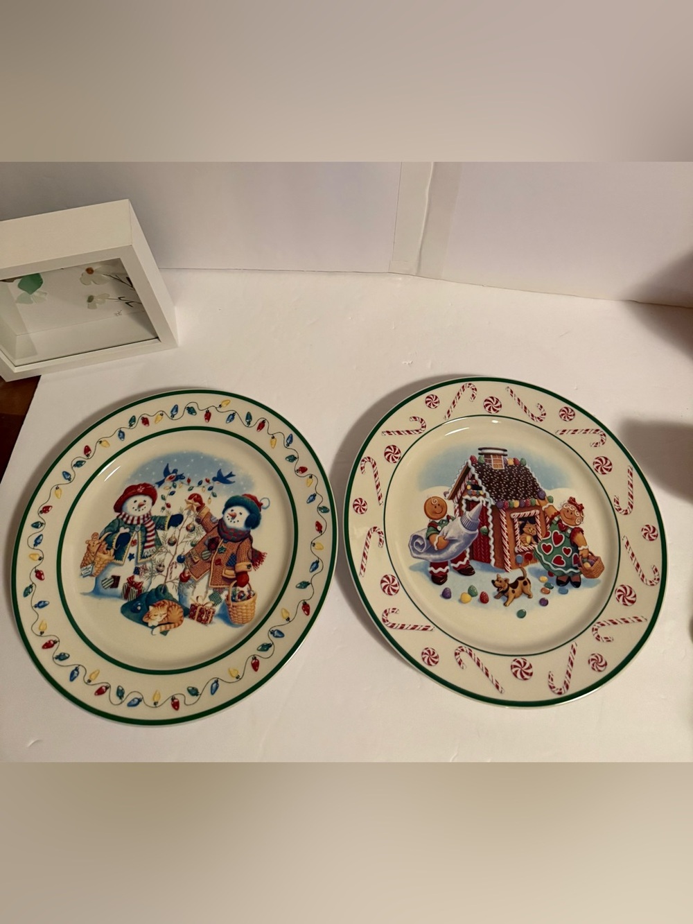 Longaberger snow friends, and Roger and Ginger pottery plates 1999 & 2000